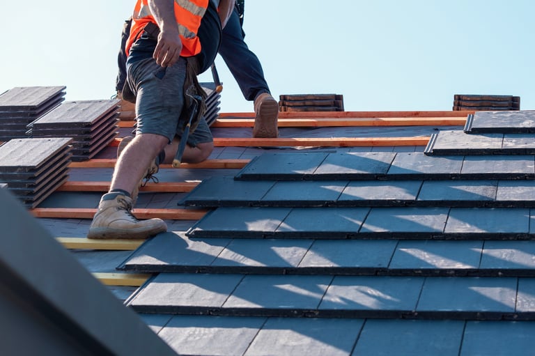 Professional roofing team at work